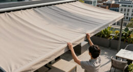 Heatherwick Studio and SPPARC shelter rooftop terrace with pleated canopy at London's Olympia
