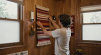 A Basically All-Wood Paneled '70s Bathroom Got an Americana Folk Makeover
